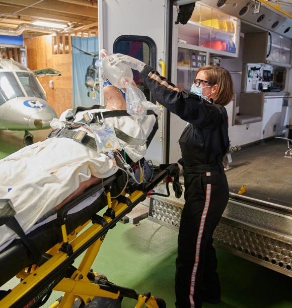 North Memorial Health team member training near an ambulance