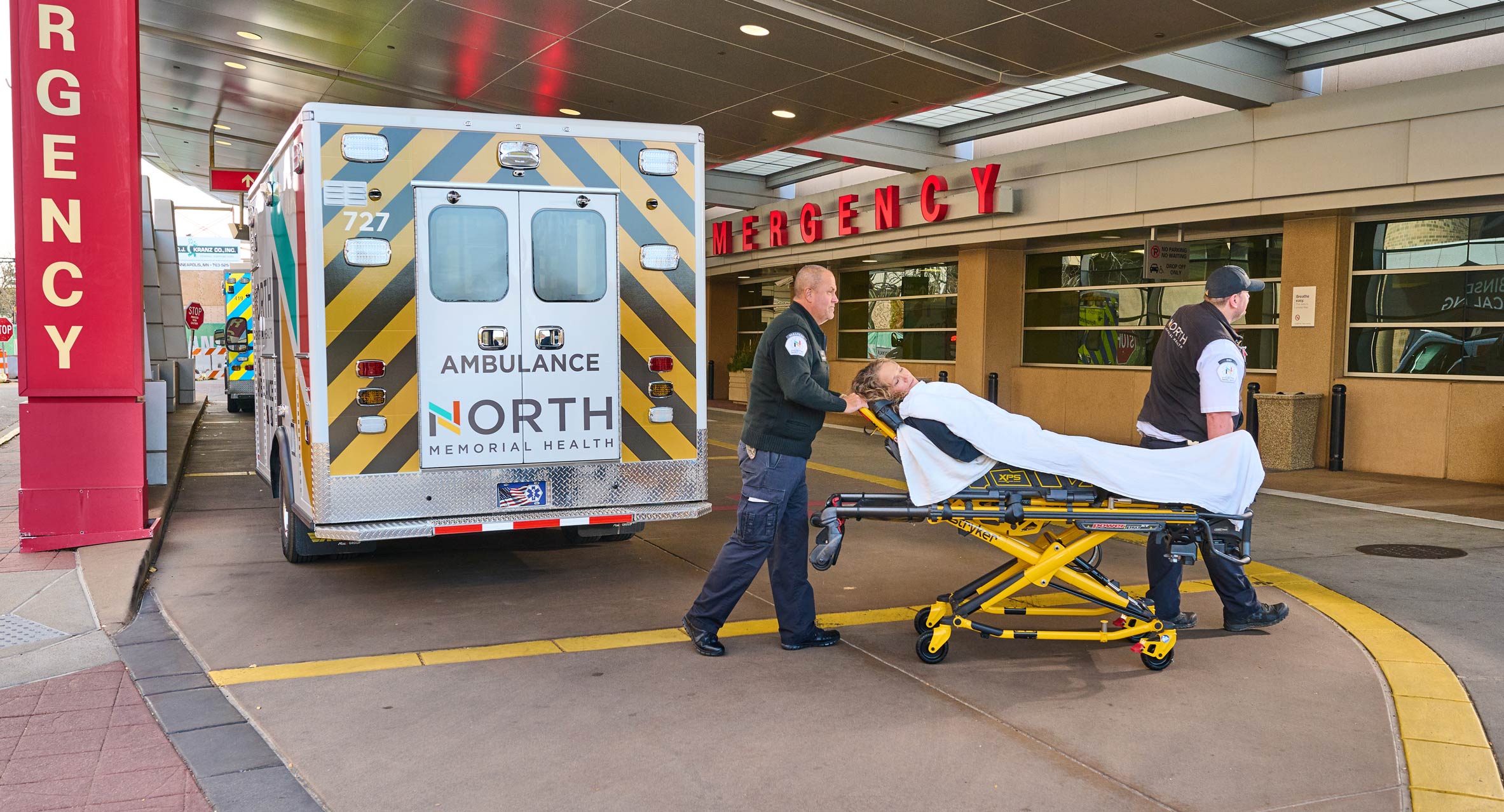 North Memorial Health Ambulance Team Transporting Customer